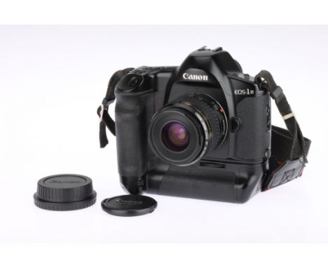 A Canon EOS 1N 35mm SLR Camera black, serial no.120805, with an EF f/4-5.6 35-80mm lens, does not power up, battery corrosion