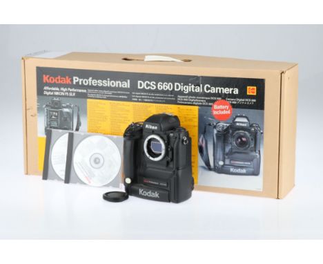 A Nikon F5 Kodak Professional DCS 660 Digital SLR Camera, black, serial no. 01203, body, VG, untested, omplete with maker's o