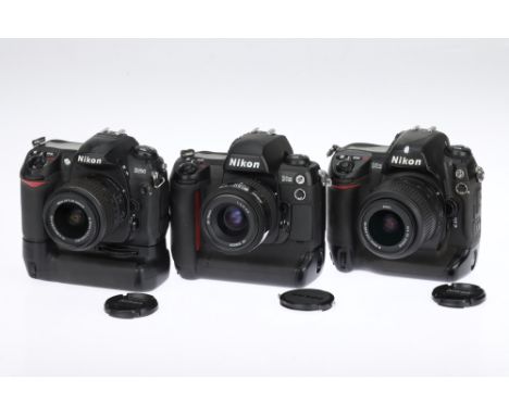 Three Nikon DX DSLR Cameras comprising a Nikon D200 camera with an AF-S Nikkor DX VR f/3.5-5.6 GII 18-55mm lens, no batteries