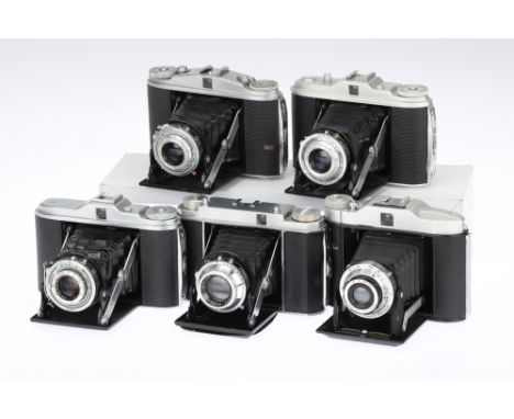 A Mixed Selection of Five Medium Format Folding Cameras comprising an Agfa Isolette I, an Agfa Isolette II, an Agfa Isolette 