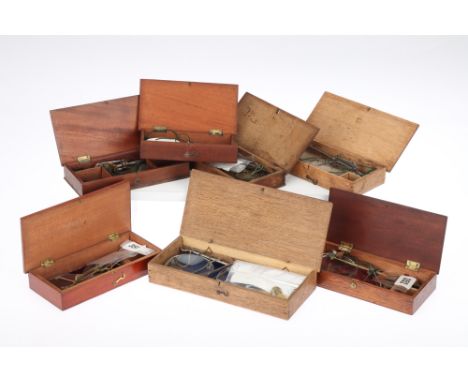 Collection of Hand-Held Scales in Cases, mostly Victorian in wooden cases most with weights (x7) Provenance: collected at Chr