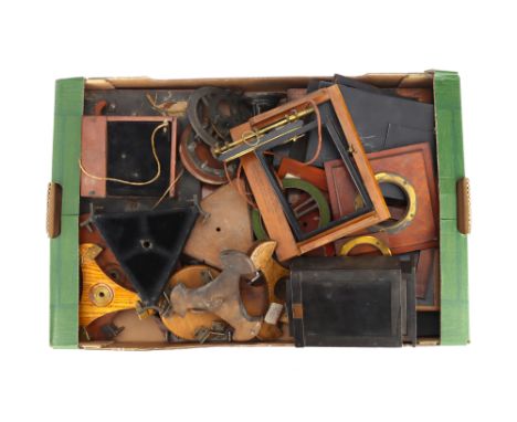A Mixed Selection of Mahogany &amp; Brass Camera Accessories, to include tripod adaptors, a lens shutter, &amp; range of part