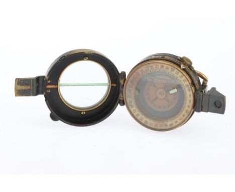 A WWI British Military Compass, marked 'F. Barker &amp; Son Makers London 1917 N IV' liquid filled, some bubble within,