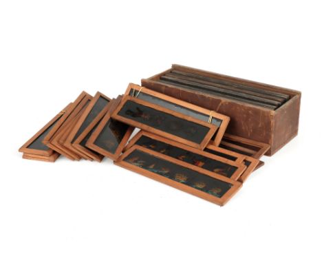 A Large Collection of Victorian Magic Lantern Slides, comprising of various part sets of mahogany framed hand-pained slides i