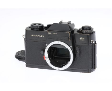 A Leitz Leicflex SL MOT 35mm SLR Camera, black paint, body G, shutter working, shutter button will not release shutter, howev
