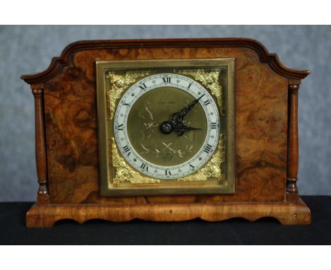 Mantle clock in walnut case. Pyke &amp; Sons. An Elliot Clock. Mid 20th century. H.14.5 W.22 D.7cm. 