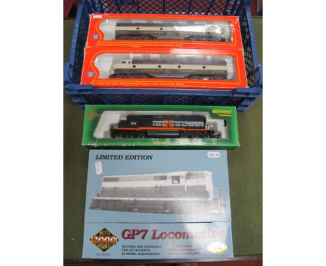 Four 'HO' Gauge Boxed U.S.A Outline Diesel Locomotives, a Proto 2000 GP7 Bo-o "Everwhere West" livery, a Mehano Co-Co EMD SD4