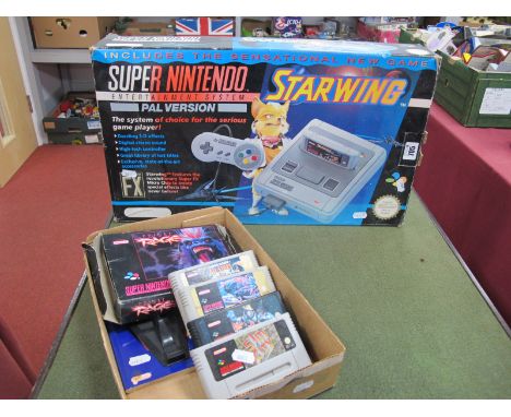 A Boxed Super Nintendo Entertainment System (SNES) Gaming Console, with one original hand controller, Starwing Game Cartridge