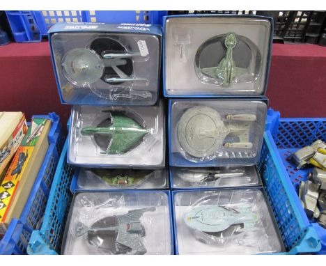 Eight Star Trek Diecast Model Space Ships, to include U.S.S Enterprise, K'Tinga Class battle cruiser, U.S.S Voyager, boxed.
