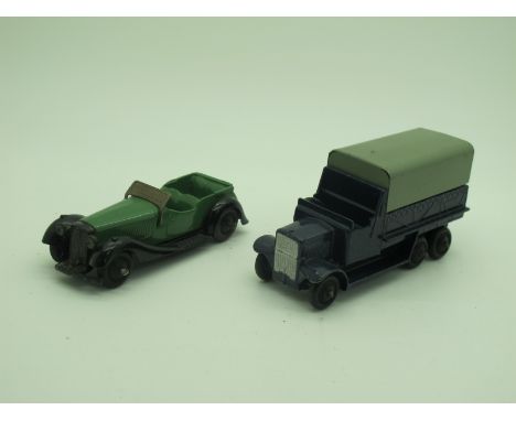 A Dinky Toys No 36F British Salmson Four Seater Sports Car, in green with tinplate windscreen, black ridged hubs and moulded 