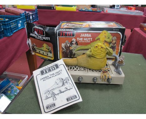 A Kenner Star Wars Return of The Jedi Jabba The Hutt Action Playset, boxed contents include Jabba prison with two trap doors,