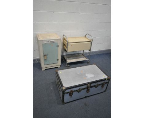 A VINTAGE GALVANISED TRAVELLING TRUNK, along with a Hawkins electric hostess trolley, a vintage meat safe and a vintage house