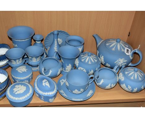 A GROUP OF WEDGWOOD PALE BLUE JASPERWARES, eighteen pieces to include a teapot, two cream jugs, two covered sugar bowls, a te