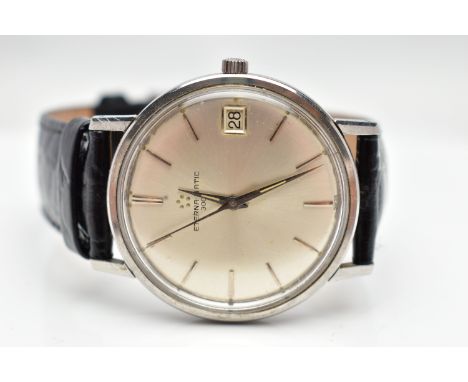 AN 'ETERNA-MATIC' WRISTWATCH, hand wound movement, round silver dial signed 'Eterna-matic 3000', baton markers, date window a