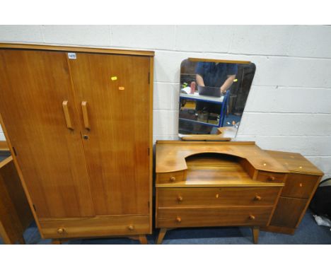 A MID CENTURY WALNUT THREE PIECE BEDROOM SUITE, comprising a gentleman's wardrobe, with two doors, above a single drawer, wid