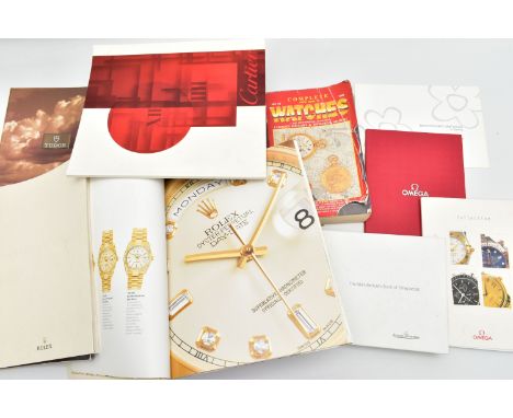 A SELECTION OF WATCH CATALOGUES AND BOOKLETS, to include an 'Omega collection' booklet, an 'Omega ' 2001 booklet, a 'Jaeger-L