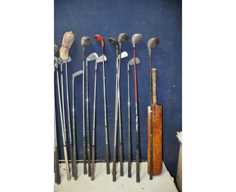 A LARGE COLLECTION OF VINTAGE GOLF CLUBS to include 32 golf clubs from modern to antique wooden shafted clubs brands include 