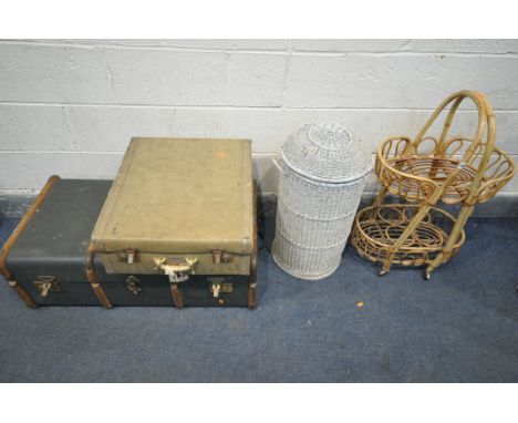 A TWO TIER RATTAN DRINKS TROLLEY, a white painted cylindrical linen basket, a canvas and wooden banded travelling trunk, and 