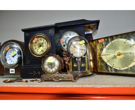 A GROUP OF EIGHT MANTEL CLOCKS,  comprising a  Kieninger &amp; Obergfell glass domed clock made in West Germany, height 23cm,