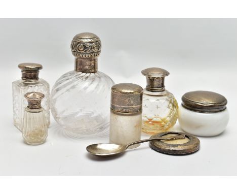 A SELECTION OF GLASS BOTTLES, A SILVER SPOON AND PHOTO FRAME, comprising five glass bottles with silver lids, two bottles cir