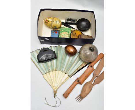 A BOX OF ASSORTED ITEMS, to include a polished wooden egg inscribed 'Jerusalem', a set of AF nesting eggs, a large glass baub