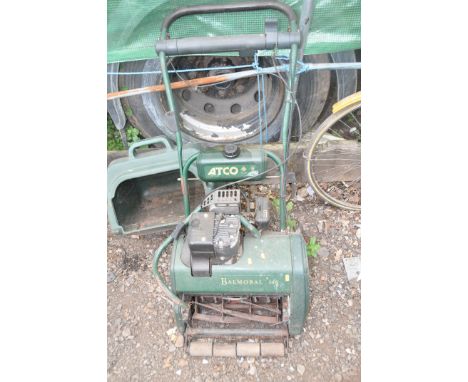AN ATKO BALMORAL 14S PETROL CYLINDER MOWER with grass box (engine pulls freely and starts but speed adjustment doesn't appear