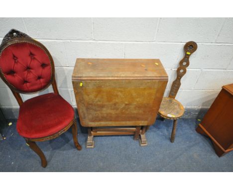 A BEN SETTER SPINNING CHAIR, an Italian buttoned chair, and an oak gate leg table (condition:-surface damage, broken leg to t