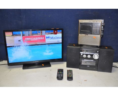 A PANASONIC TX-24G302B 24in TV with remote along with a Logik LHFCDC10 mini hi-fi with no remote and a Philips 073 three band