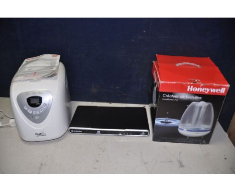 A MORPHY RICHARDS 48280 FAST BAKE along with Honeywell HH200E ultrasonic humidifier and a Sagem freesat+ digital tv recorder 