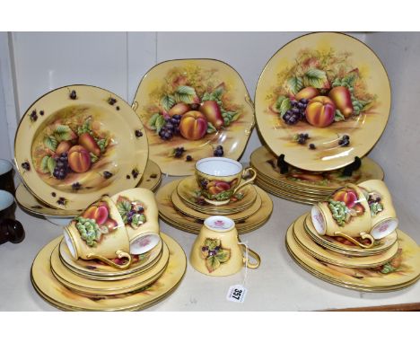 A THIRTY TWO PIECE AYNSLEY 'ORCHARD GOLD' PART DINNER SERVICE, comprising a cake plate, two vegetable dishes, six dinner plat