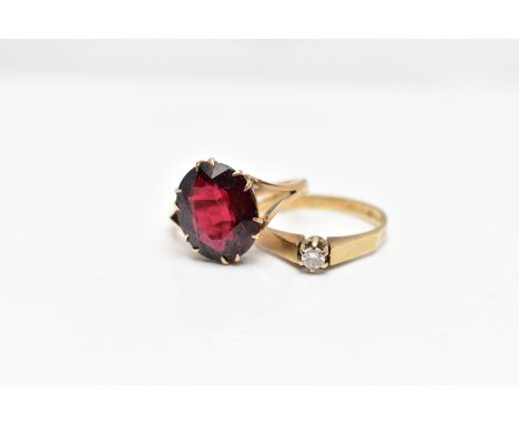 A 9CT GOLD DIAMOND RING AND YELLOW METAL GARNET RING, a single stone diamond ring, round brilliant cut, approximate total dia