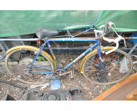 A VINTAGE MARLBORO GENTS RACING BIKE with 5 speed Huret gears and 22in frame