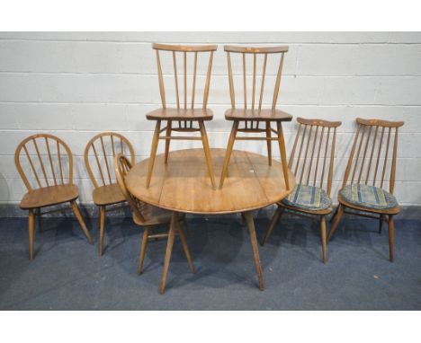 AN ERCOL ELM DROP LEAF DINING TABLE, open length 107cm x closed depth 115cm x closed length 64cm x height 71cm, along three m
