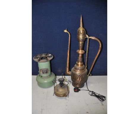 A VINTAGE VALOR 106R PARAFFIN HEATER along with a vintage copper ewer with brass top converted into lamp and a vintage brass 