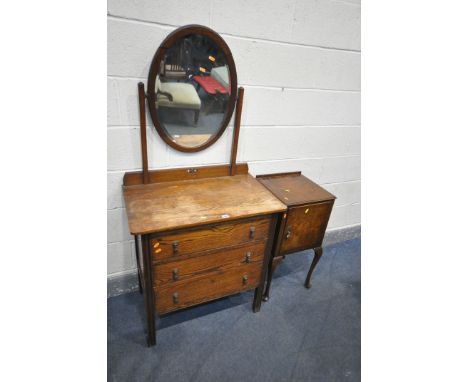 A SOLID OAK DRESSING CHEST, with a single oval mirror, and three drawers, width 77cm x depth 46cm x height 155cm x height of 