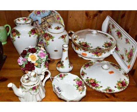 A GROUP OF ROYAL ALBERT OLD COUNTRY ROSES GIFTWARES AND DINNERWARES, comprising a small novelty teapot, a tureen (handle brok