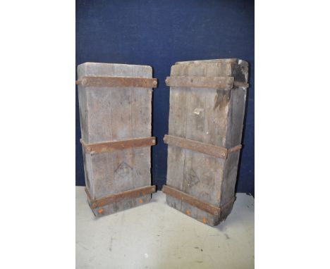 TWO VINTAGE WOODEN BOXES WITH IRON BANDING measuring width 40cm x depth 24cm x height 89cm