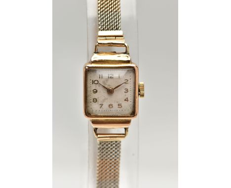 A LADIES WRISTWATCH, hand wound movement, square white dial, Arabic numerals, gold tone hands, within a polished yellow metal