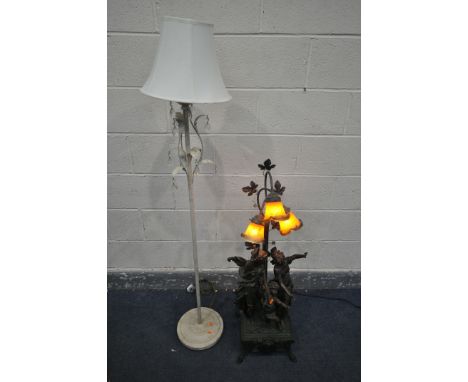 AN ART DE FRANCE RESIN FIGURAL LAMP, the three branches with orange glass shades, depicting two females and a child, height 1