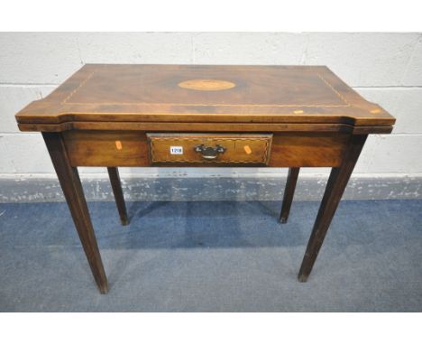 A GEORGIAN FLAME MAHOHANY CARD TABLE, with box string and central shell inlay, the fold over top enclosing a green baize play