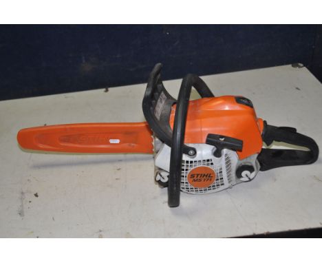 A STIHL MS171 PETROL CHAINSAW with 32cm cut (engine pull with some resistance and hasn't been started)