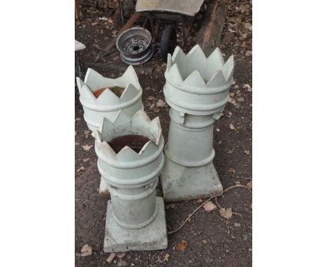 THREE CROWN TOPPED VINTAGE CHIMNEY POTS of different heights the tallest being 87cm the smallest 72cm high (some damage to po
