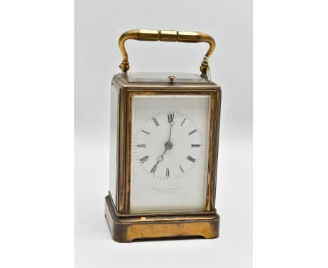 A 'HOWELL JAMES &amp; CO' REPEATING CARRIAGE CLOCK, brass carriage clock, white dial, Roman numerals, signed slightly rubbed 