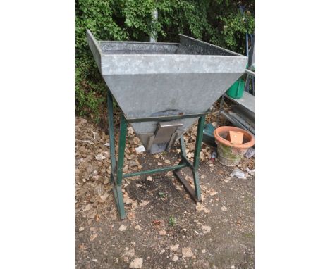 A HEAVY DUTY GALVANISED STEEL COAL HOPPER ON STAND with shute width 91cm, depth 110cm and height 135cm (apparently rated at 3