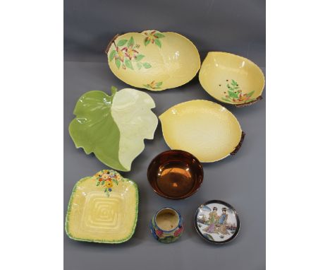 CARLTONWARE - four pieces, yellow ground leaf dishes, a small Crown Devon yellow ground floral handled dish, a Clarice Cliff 