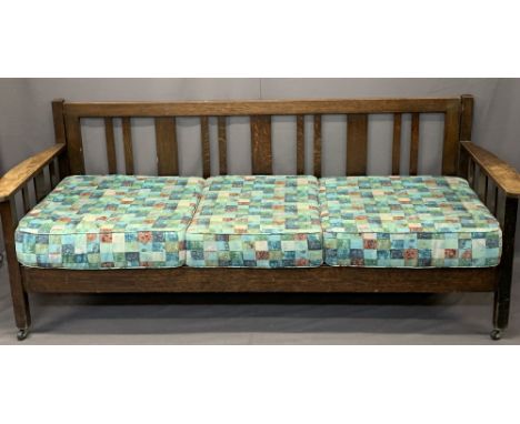 HEAL &amp; SON LTD LONDON VINTAGE OAK DAYBED - 83.5cms max H, 204cms W, 77cms overall D, 71cms seat D, Ivorine maker's label 