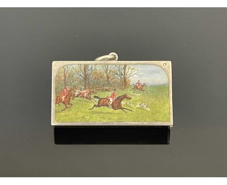 A Victorian silver and enamel vesta case, of rectangular form, with a hunting scene in polychrome enamel featuring horses, ri