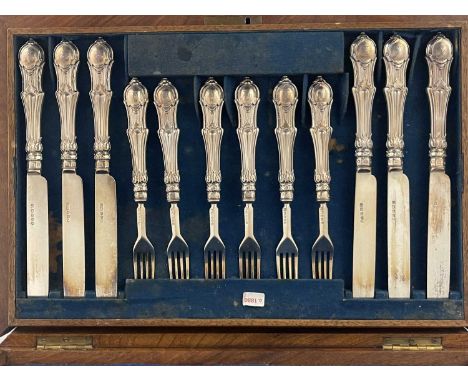 A Victorian silver knife and fork set, ensuite with fitted burr wood canteen, with hallmarked silver handles and blades, Mart