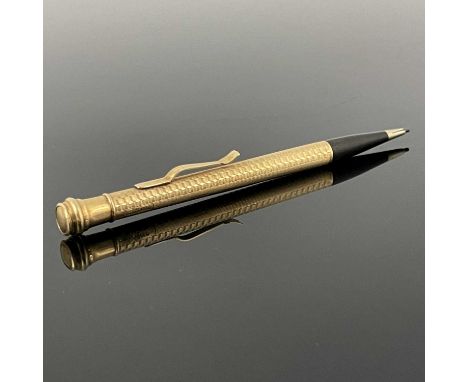 A twentieth-century 9ct gold mounted propelling pencil, the body with engine-turning, marked '9CT GOLD', length 11cm, actual 