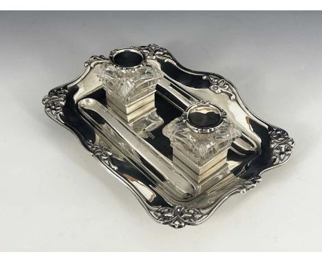 Kate Harris for William Hutton, an Arts and Crafts silver double ink stand, the rectangular tray with serpentine rim of pierc